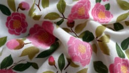 Elegant camellia pink fabric ideas for stylish home decor and fashion projects.